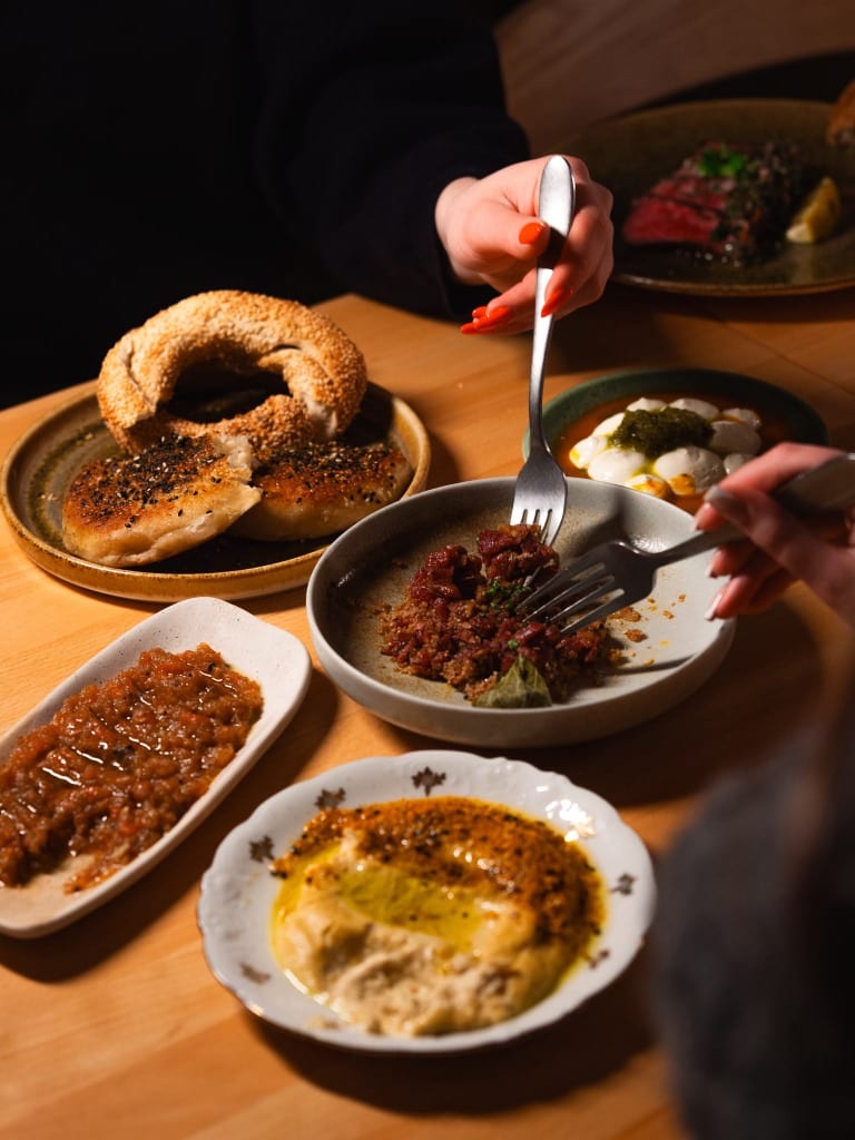 Guests enjoying a shared meze dining experience