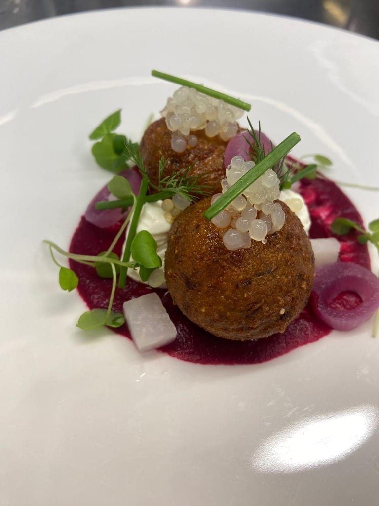 Chef Serpil Yilmaz-Rantanen elegant dish with beetroot purée and caviar